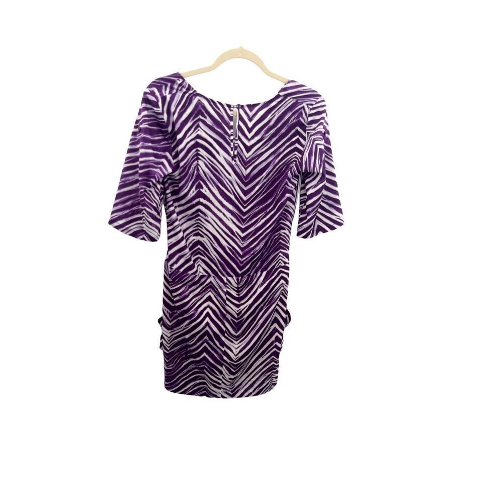 BCBG purple zebra print Flowing and light, this dress is flattering and functi